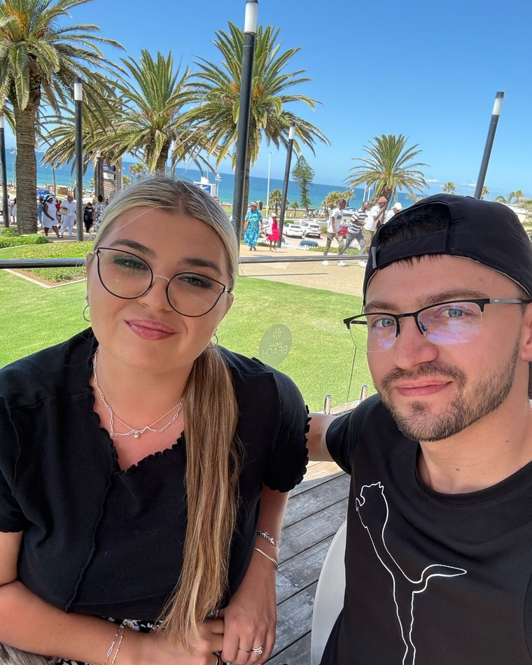 Jaco and his wife by the coast